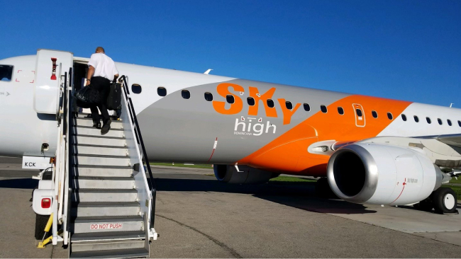 The crew boards the jet bound to bring relief supplies to the Dominican Republic.