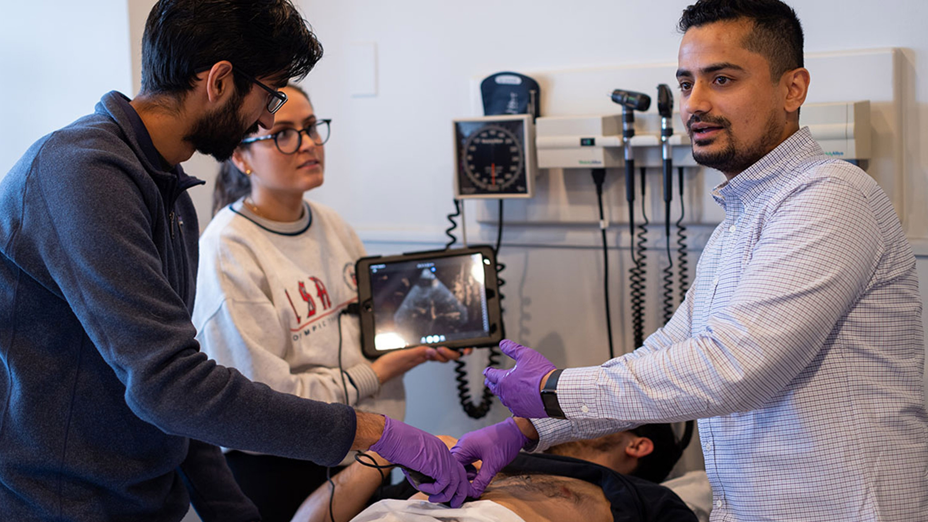 Students learn how to give a sonogram.