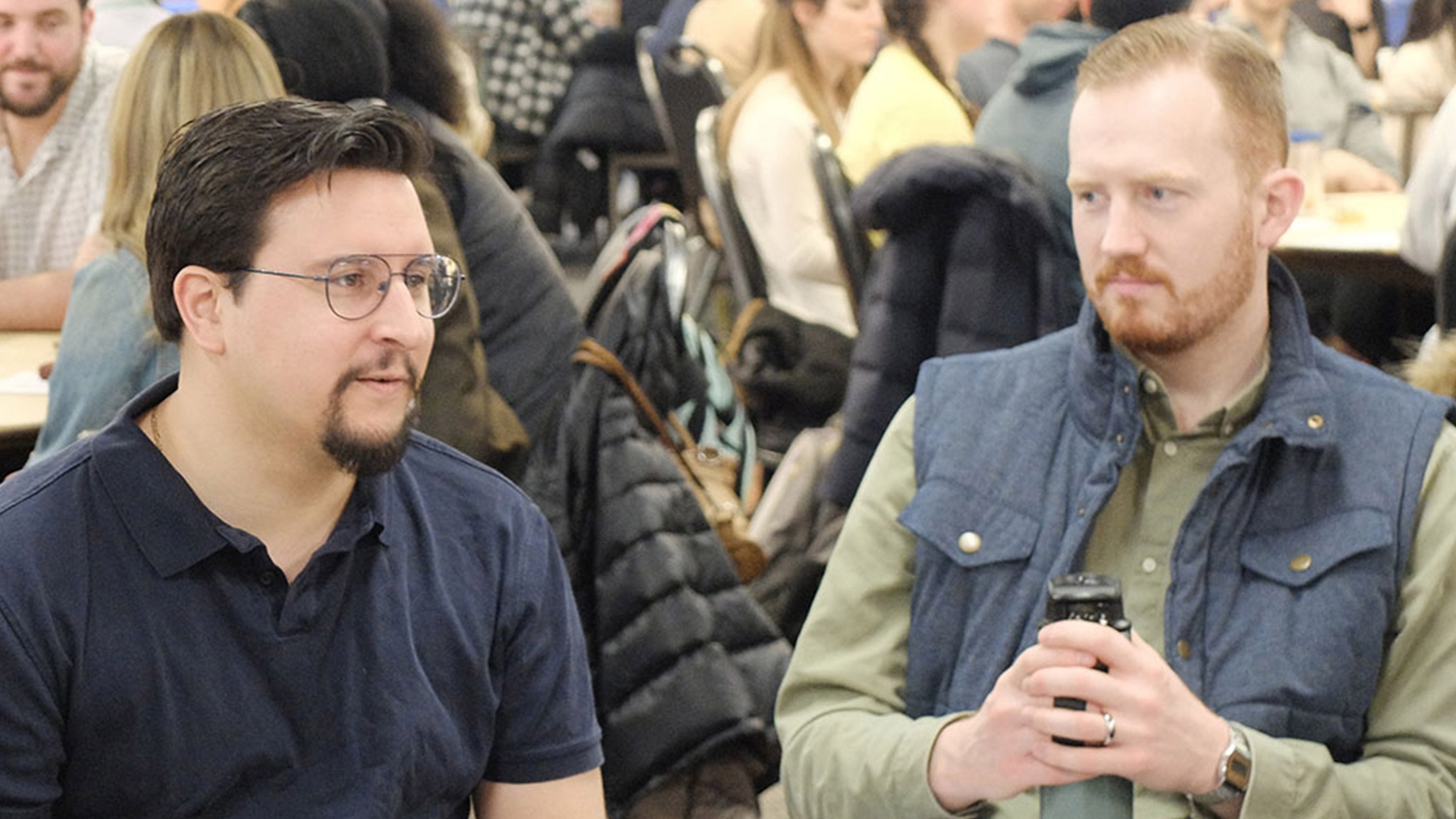 Two students sit together.