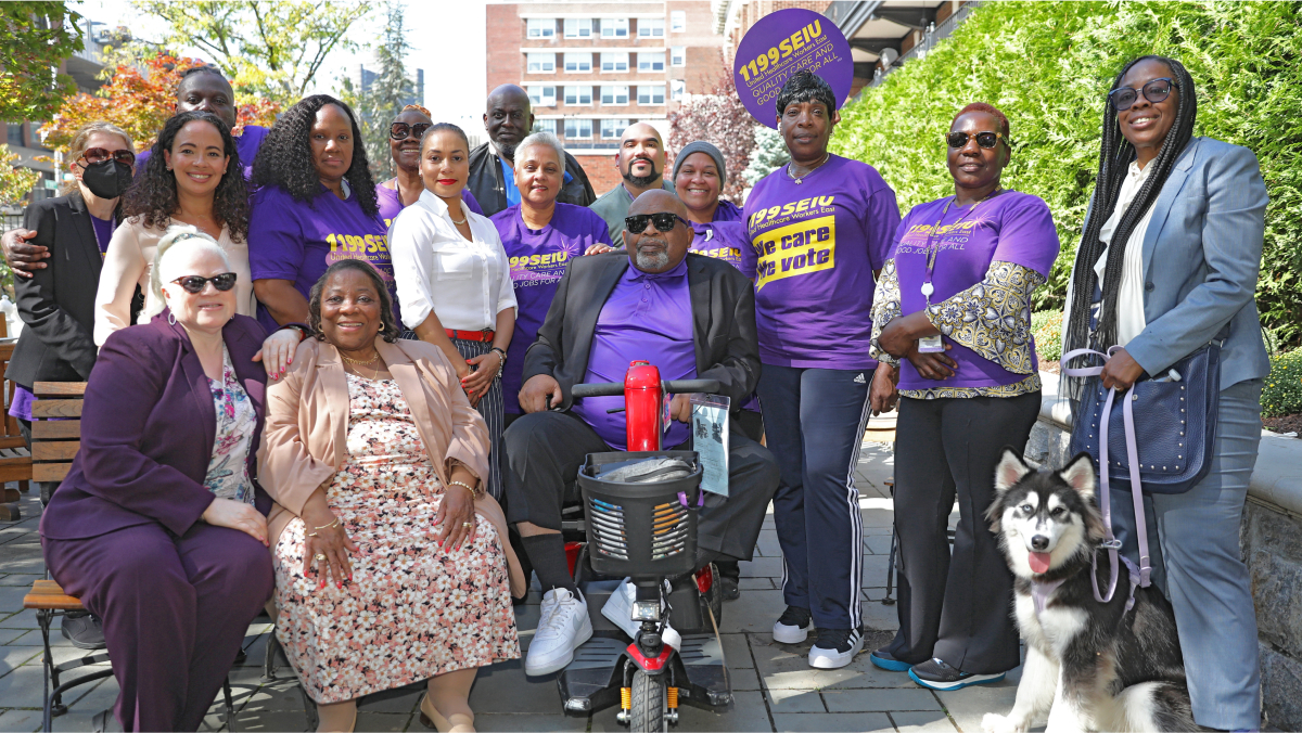 Dr. George K. Gresham and a group of friends, family and fans pose for a group photo.