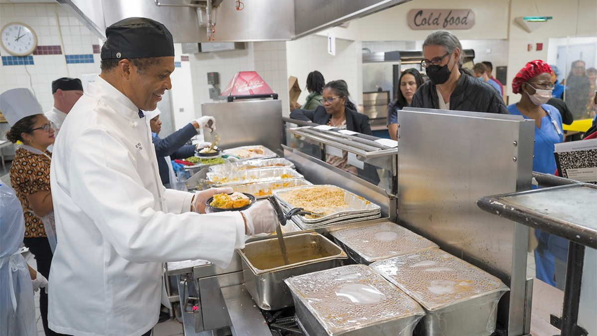 It’s Thanksgiving time at Montefiore Einstein! Philip O. Ozuah, MD, PhD, President and CEO, Montefiore Einstein, prepares a plate of Thanksgiving food for an associate.