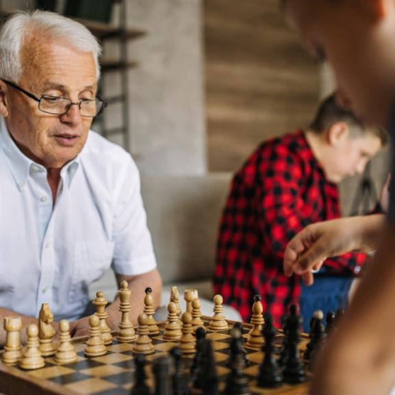 Man and a Boy playing Chess